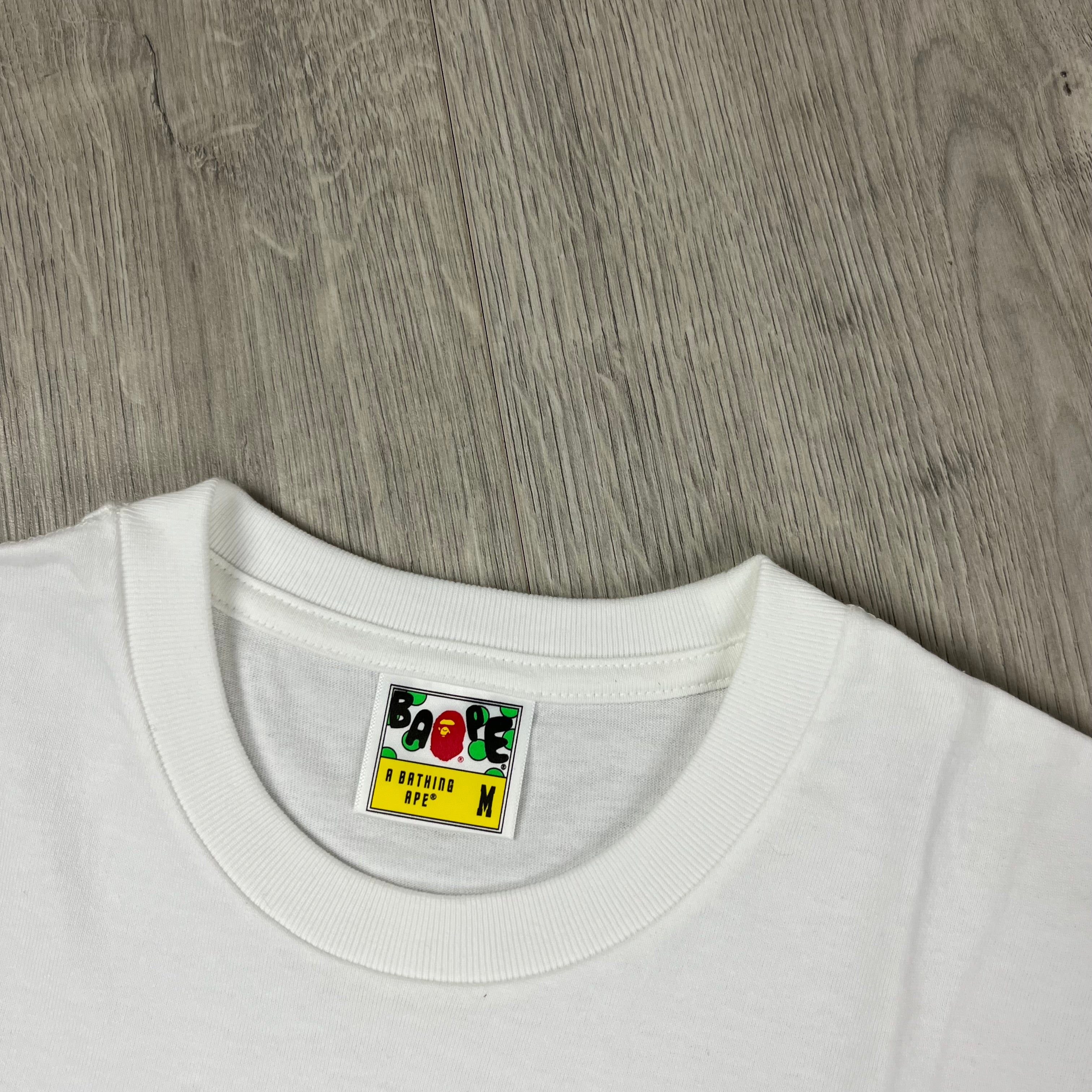A Bathing Ape 'Ape Head' Tie Dye T-Shirt in White. On sale at Open Attire.