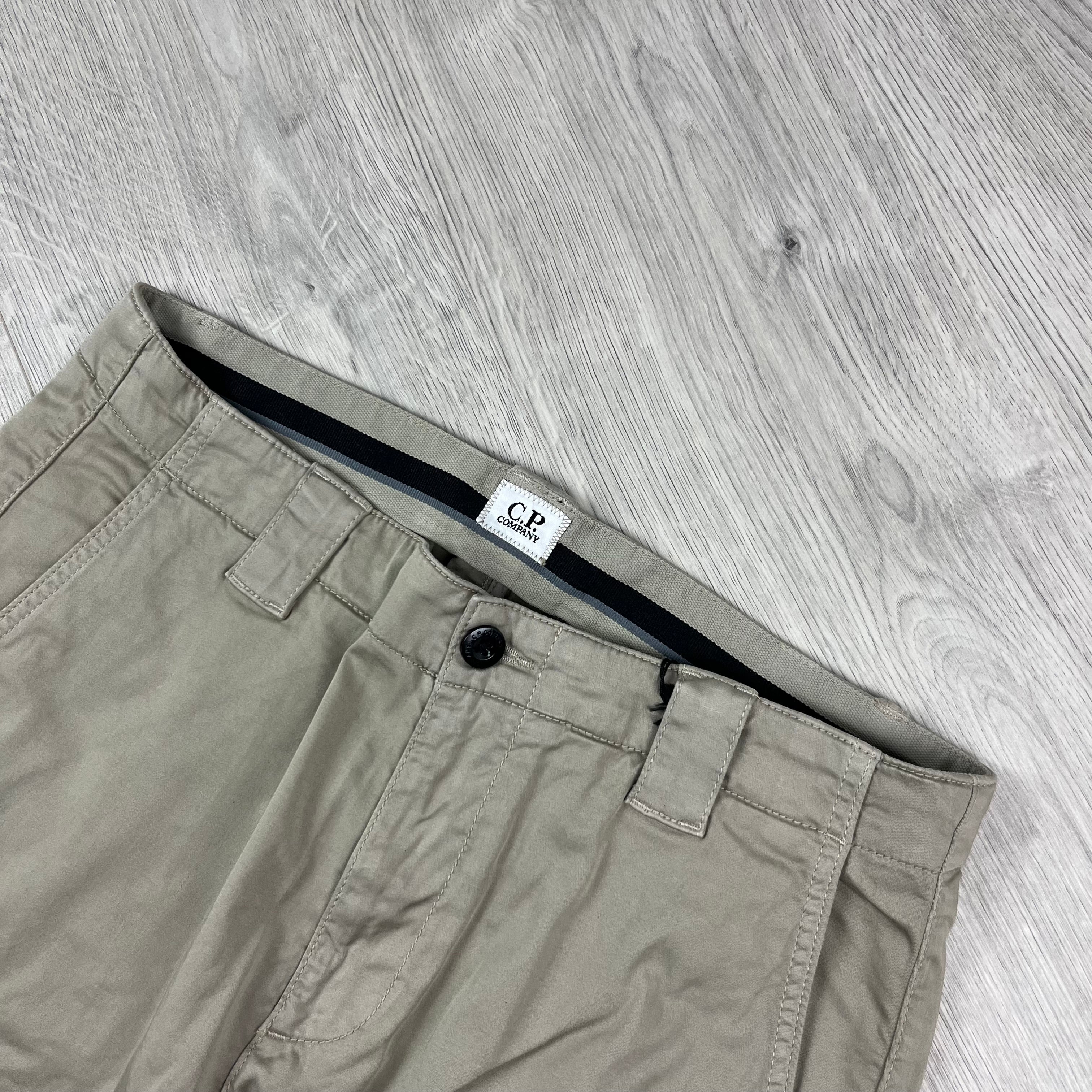 CP Company Stretch Sateen Cargo Trousers in Vintage Khaki. On sale at Open Attire.