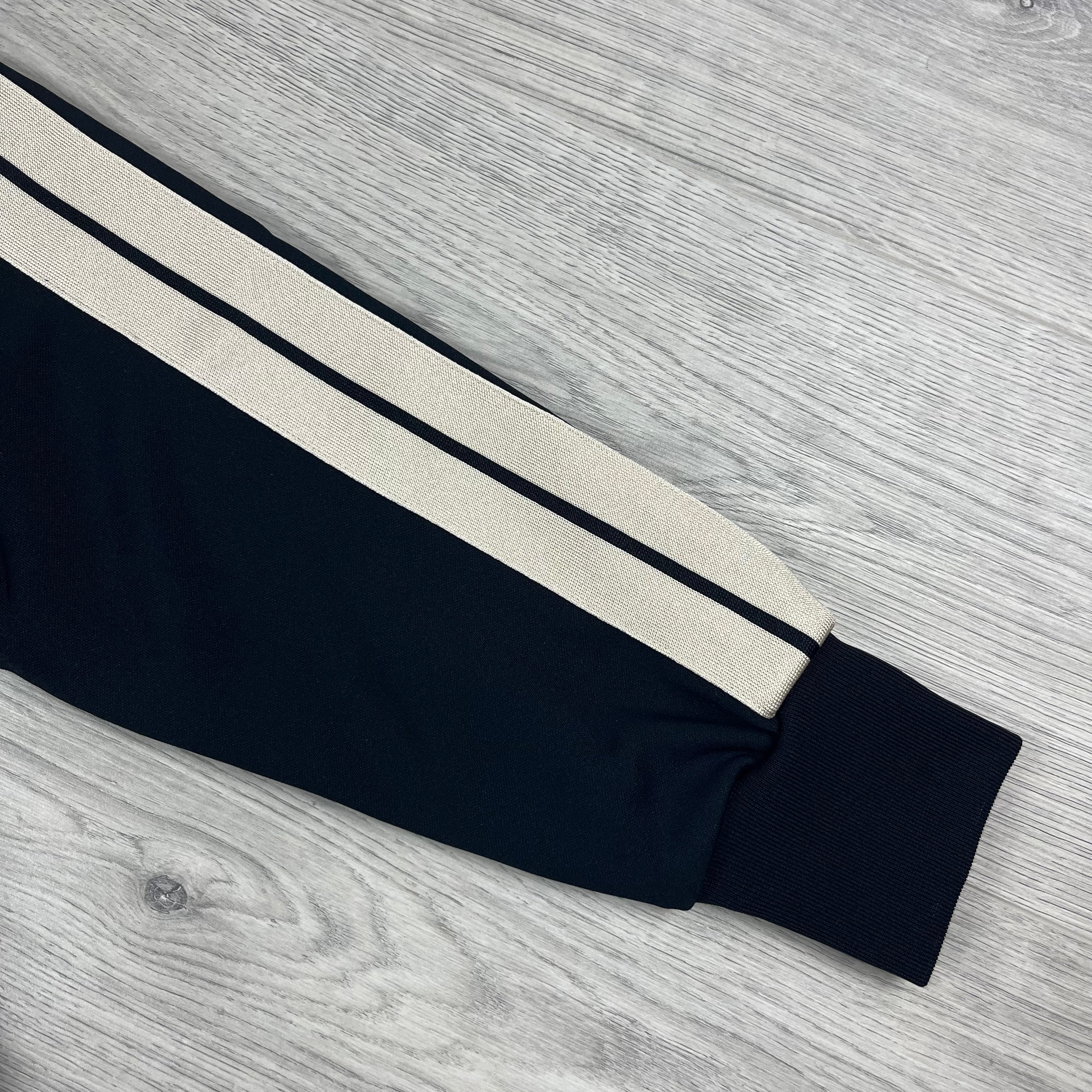 Palm Angels Embroidered Track Jacket in Black. On sale at Open Attire.