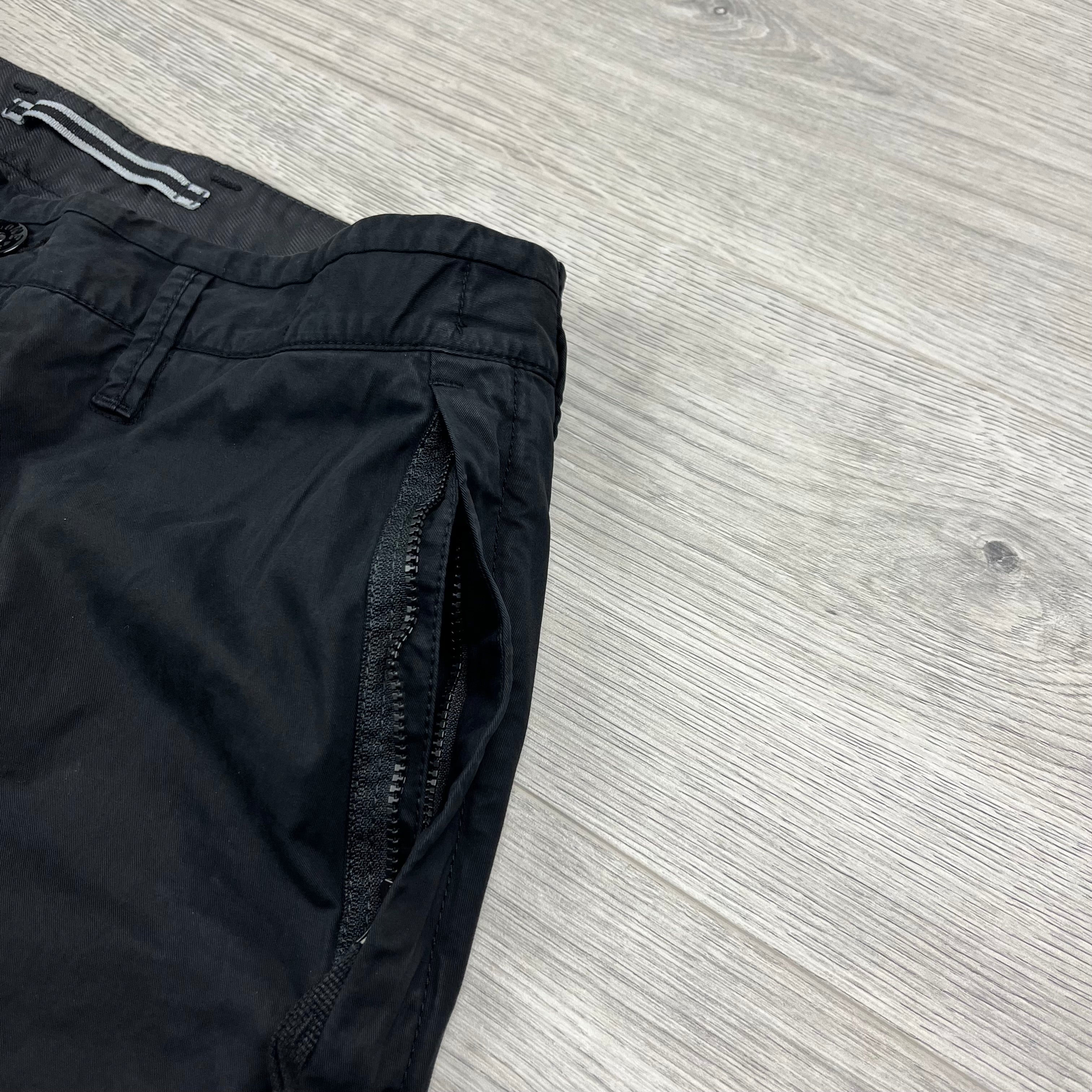 Stone Island Bermuda Cargo Shorts in Black. On sale at Open Attire.