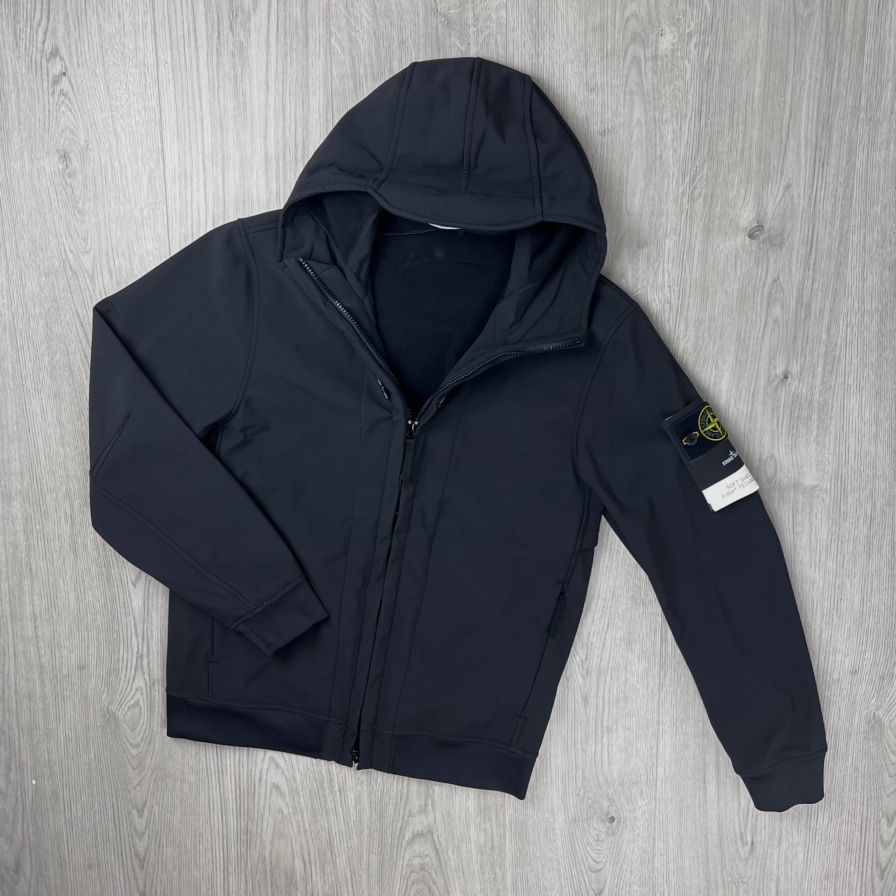 Front view of a Stone Island Soft Shell-Re.dye Jacket in Black