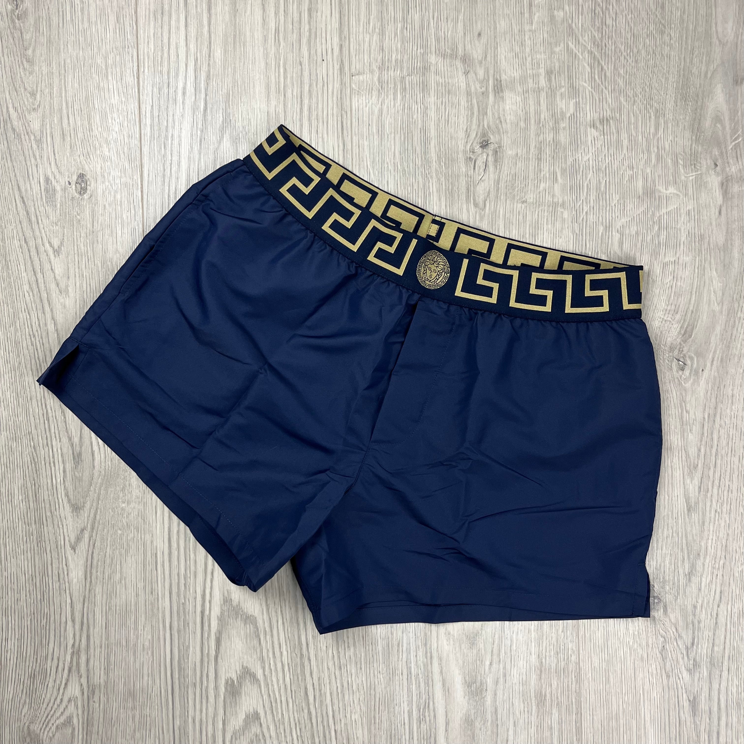 Versace Greca Swim Shorts in Navy Blue. On sale at Open Attire