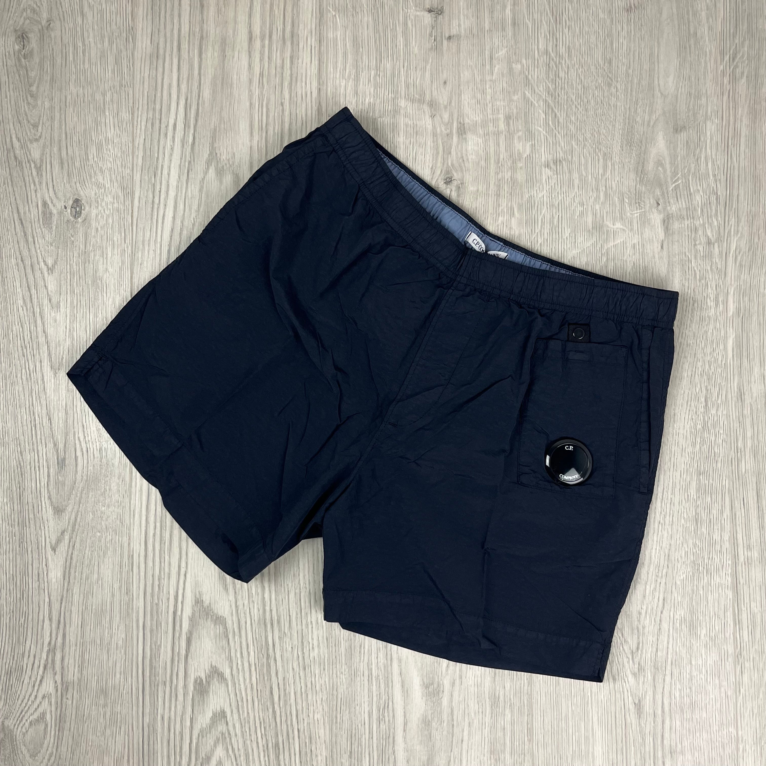 Men's CP Company Flatt Nylon Swim Shorts in Total Eclipse. On sale at Open Attire.