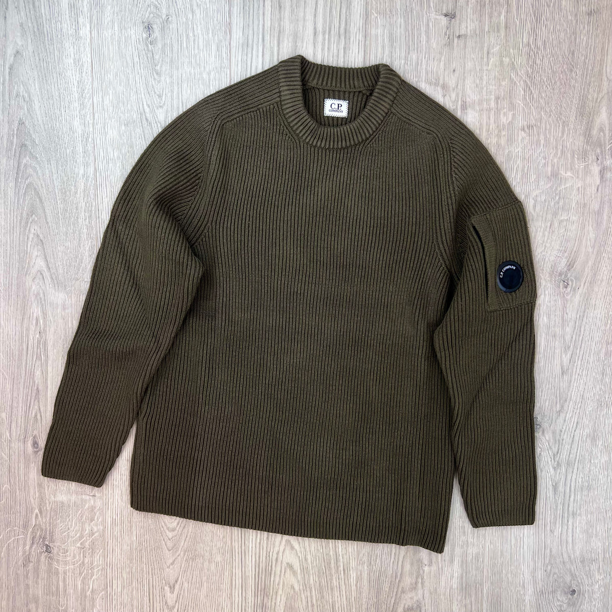 Front view of the CP Company Full Rib Cotton Knit Sweatshirt in Ivy Green.