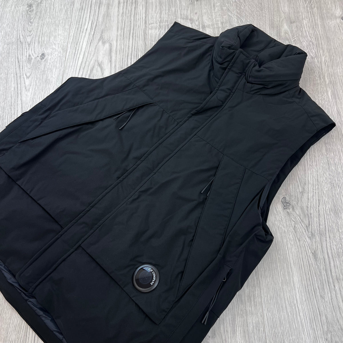 Angled view of the CP Company Pro-Tek PrimaLoft Gilet in Black.