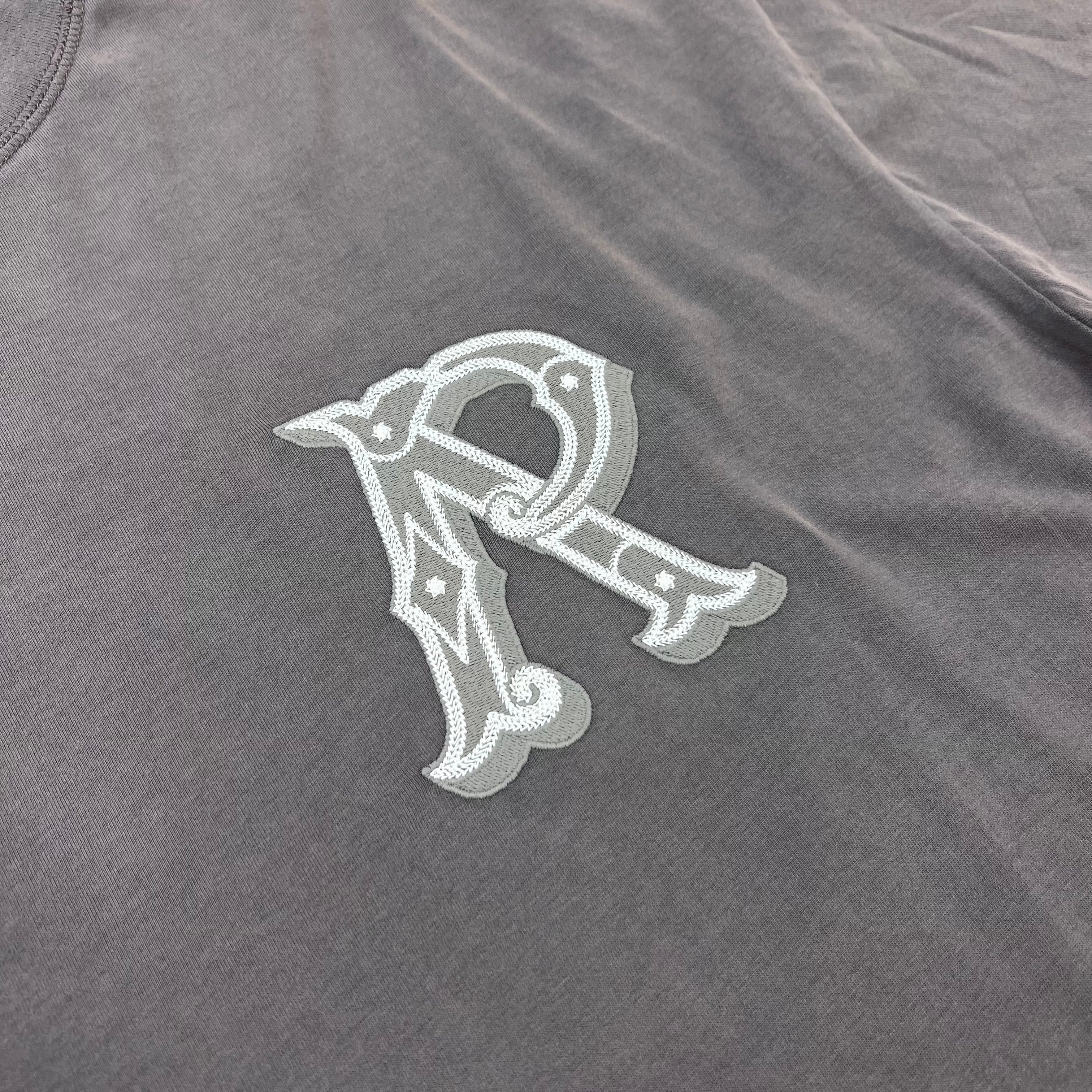 Represent 'Western Initials' T-Shirt in Flat White - Embroidered logo detail.