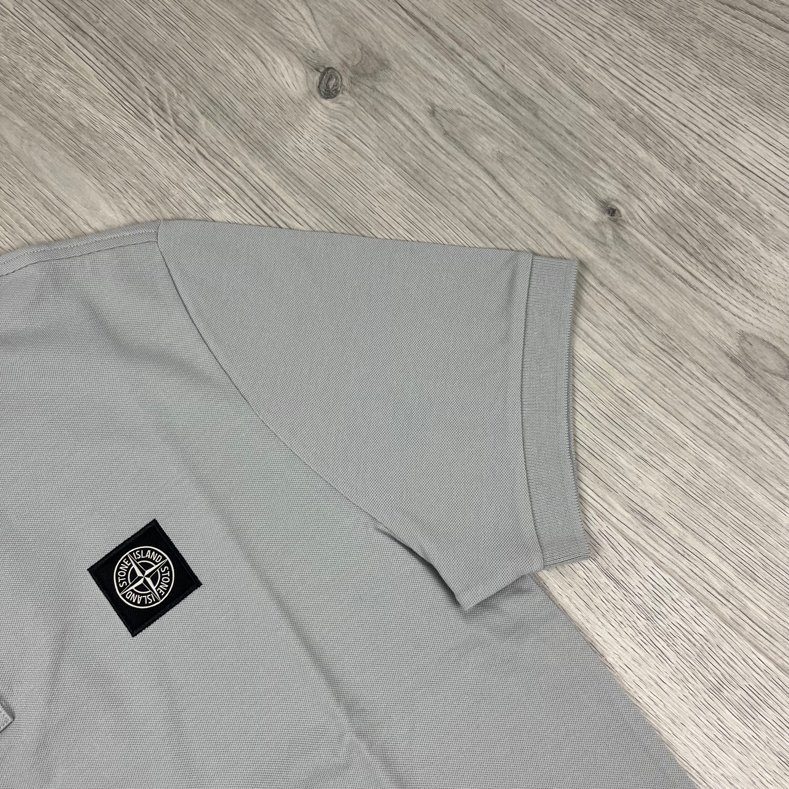 Stone Island Piqué Patch Polo Shirt in Pearl Grey. On sale at Open Attire.