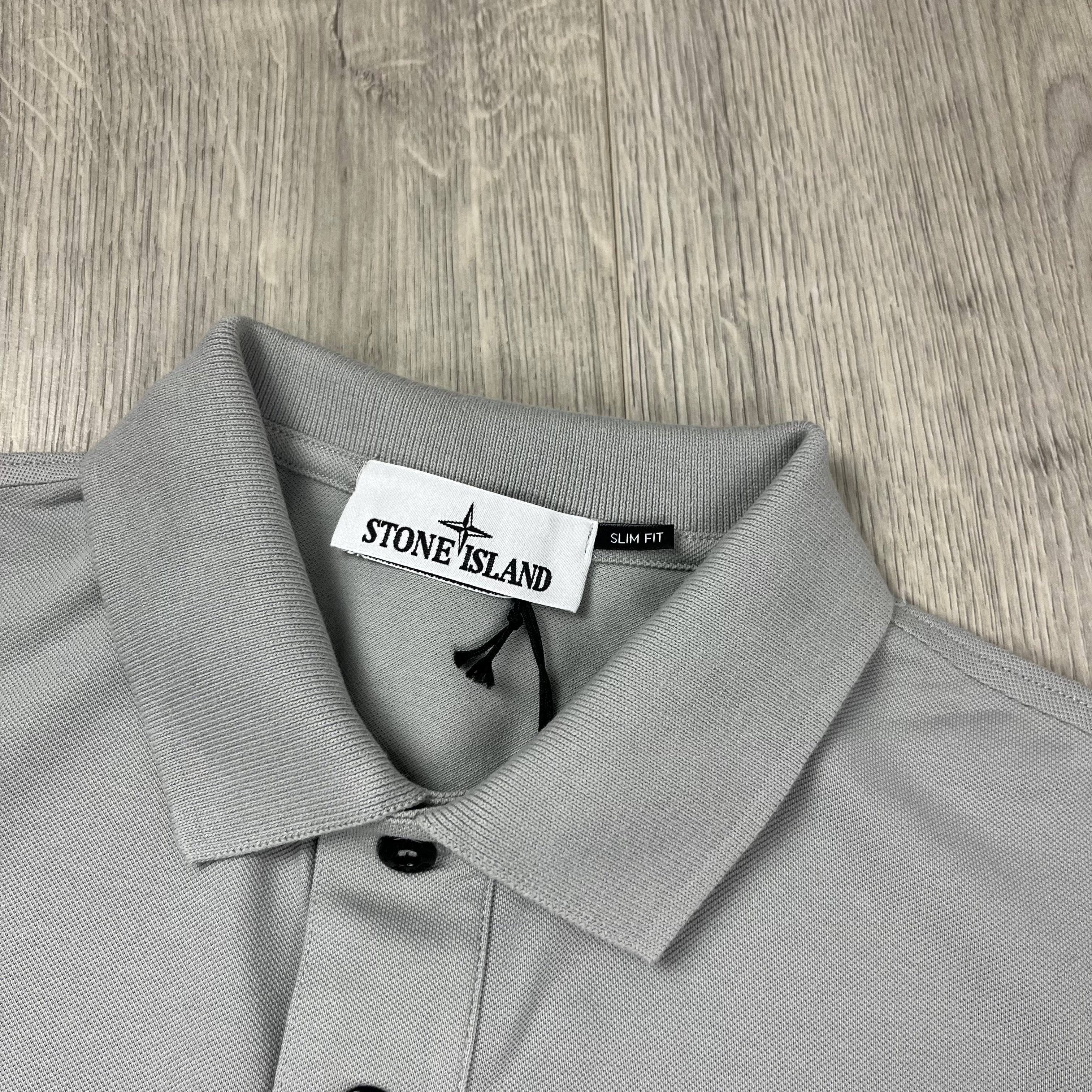 Stone Island Piqué Patch Polo Shirt in Pearl Grey. On sale at Open Attire.